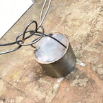 HANDCRAFTED METAL SCULPTURE OF BENT METAL FORMING AN ASTRACT SHAPE OF A PERSON JUMPING INTO A POOL, ON A ROUND METAL BASE